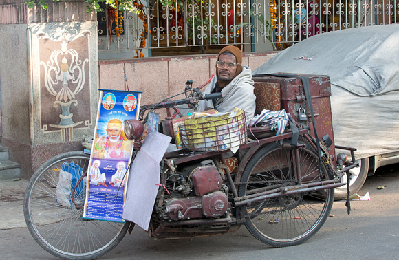 Man on motorized cart, Bengali Market, Delhi, India