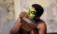 Kathakali performer applying makeup, Cochin, Kerala, India
