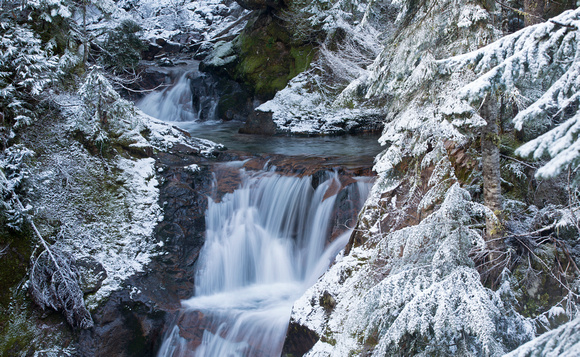 Waterfall in snow, Mt. Rainier National Park, Washington