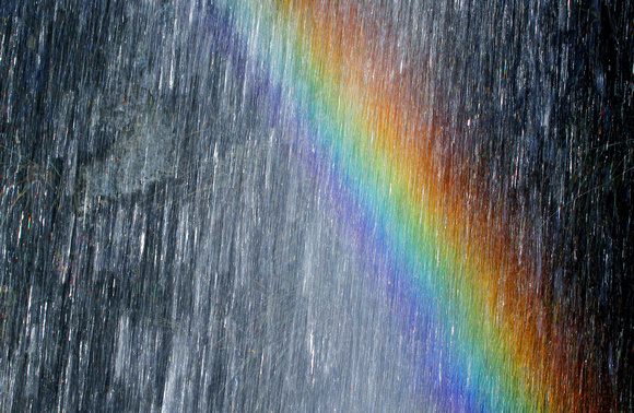 Rainbow closeup in roadside waterfall, Mt. Rainier National Park, Washington