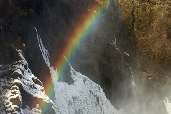 Rainbow next to Seljalandsfoss waterfall, Iceland