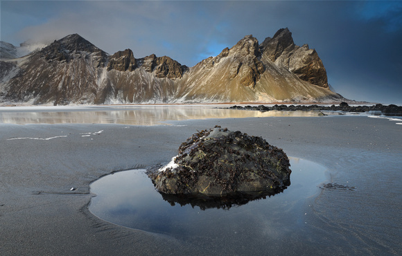 Vestrahorn mountain and intertidal rock, south coast Iceland