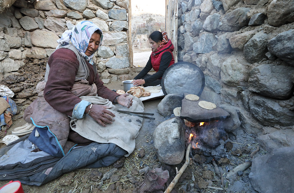 Baking traditional Ladakhi bread, Ladakh, India