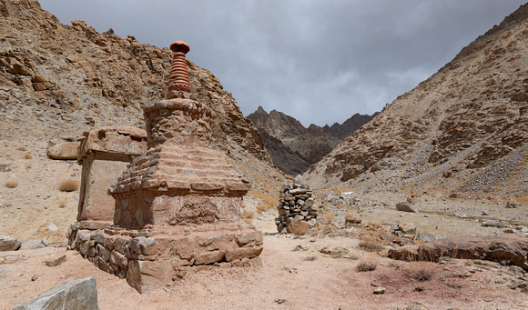 Ancient Buddhist stupa in valley, Ladakh, India