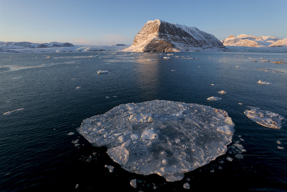 Ice and mountain in fjord, Svalbard, Norway