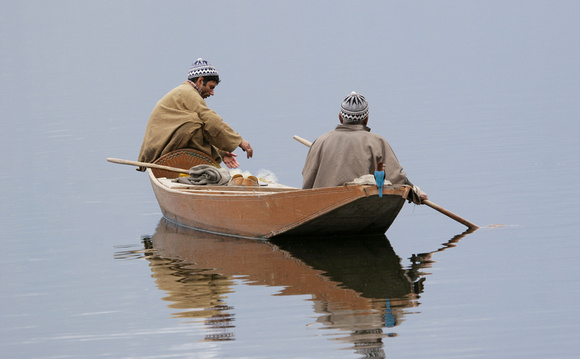 Fishermen on Dal Lake, Srinagar, Kashmir, India